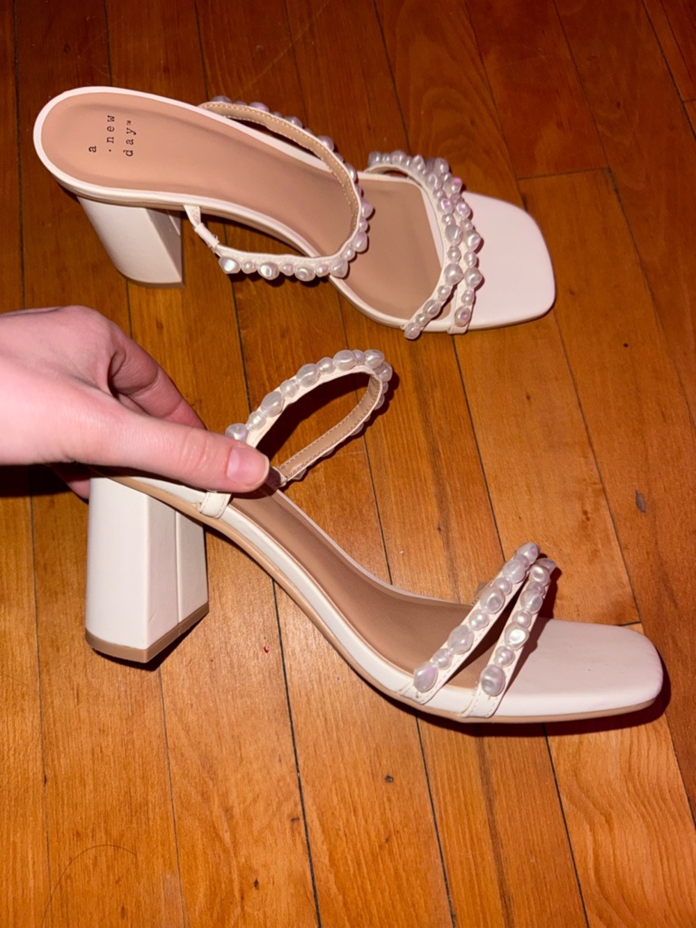 White heels with pearl detailing